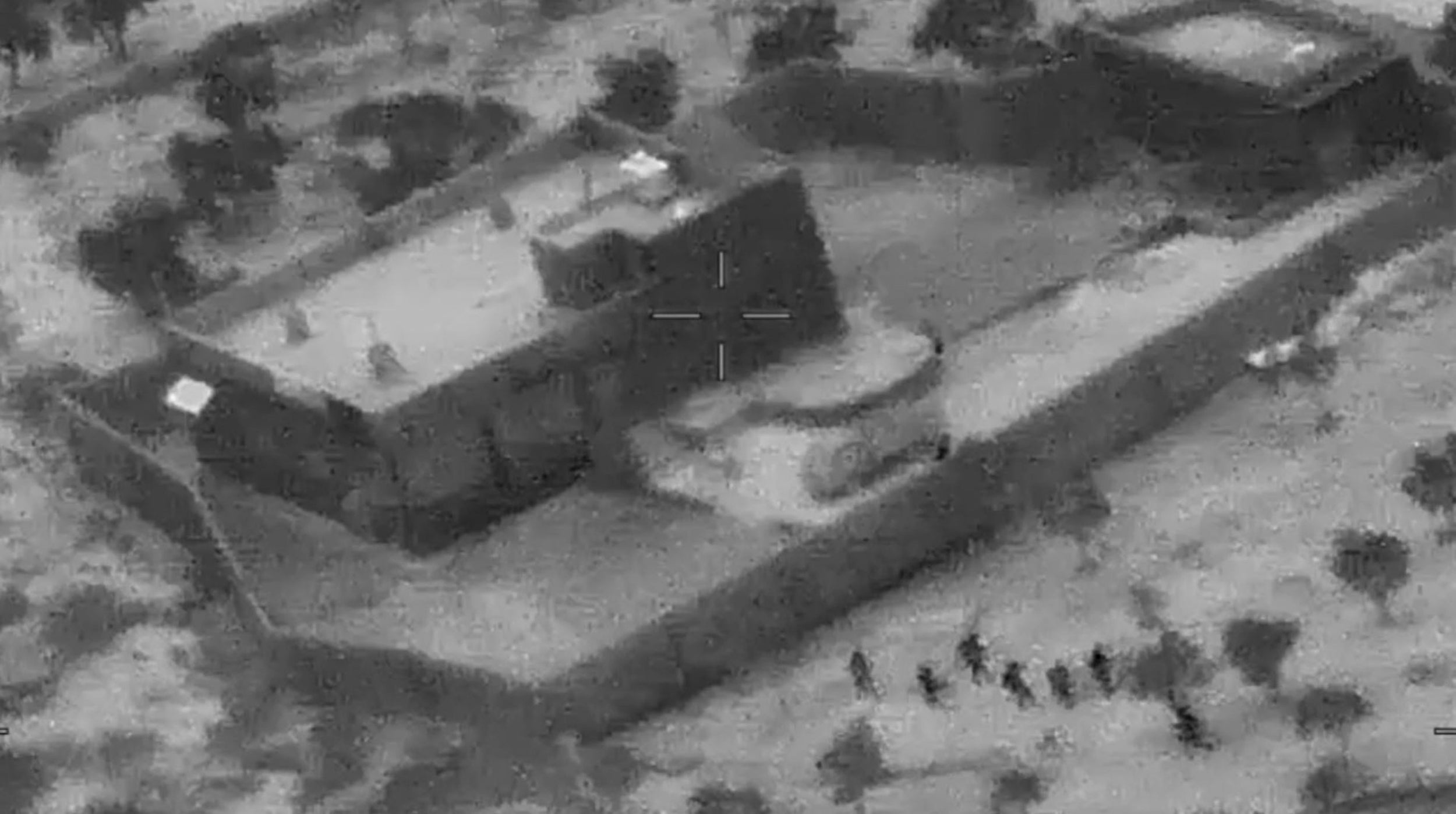 A photo released by the U.S. Defense Department showing the compound where ISIS leader Abu Bakr al-Baghdadi was killed by U.S. Special Forces in Syria
